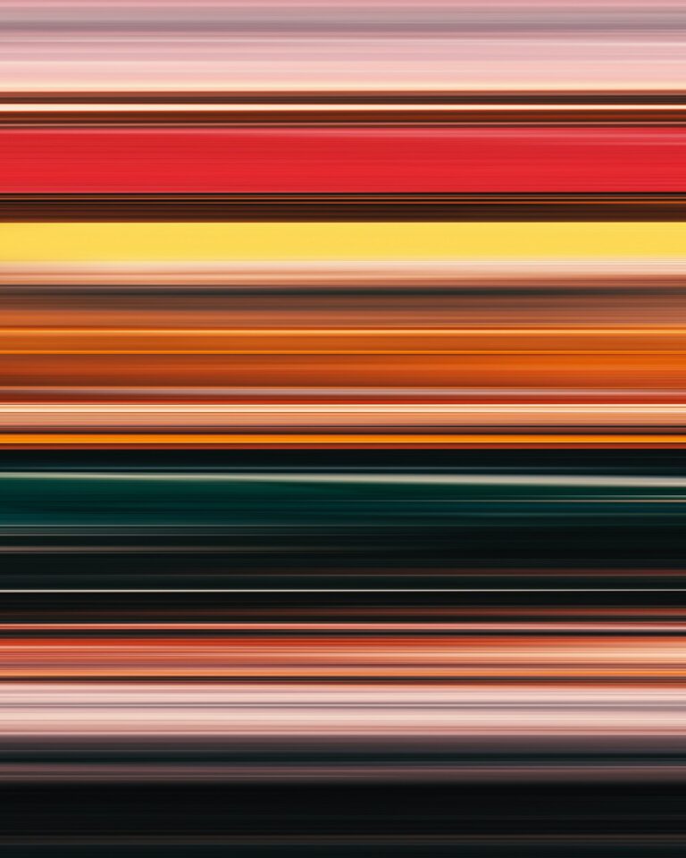 Image of color stripes on a black background. Looks like a blurred tv screen. Photo by Andrei Castanha on Unsplash